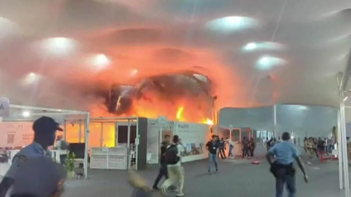 Witnesses from the ground reported seeing flames and thick smoke rising from one of the country’s pavilions. 