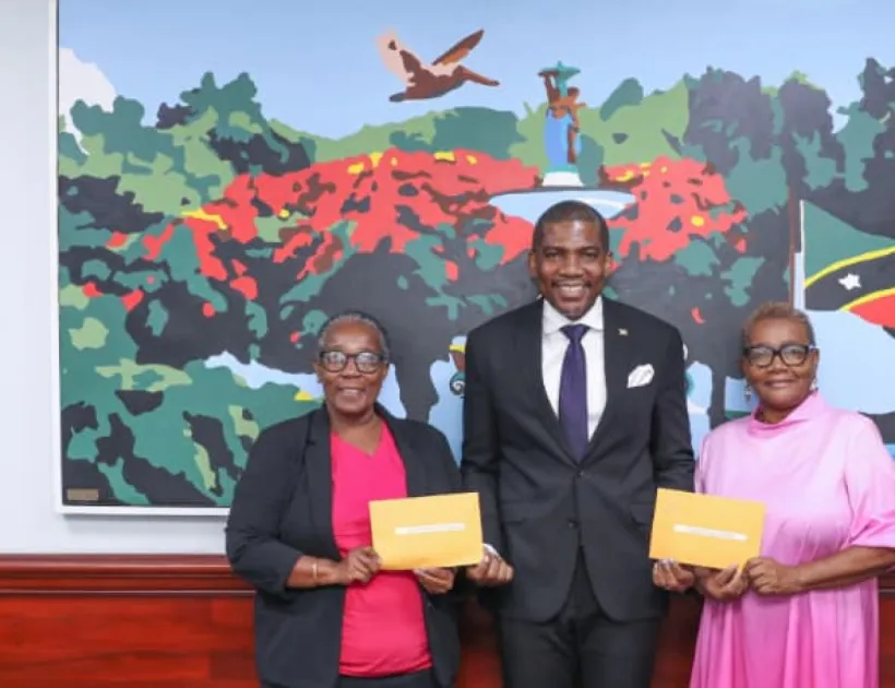 PM Drew presents EC$15,000 cheques to Breast Cancer Foundation