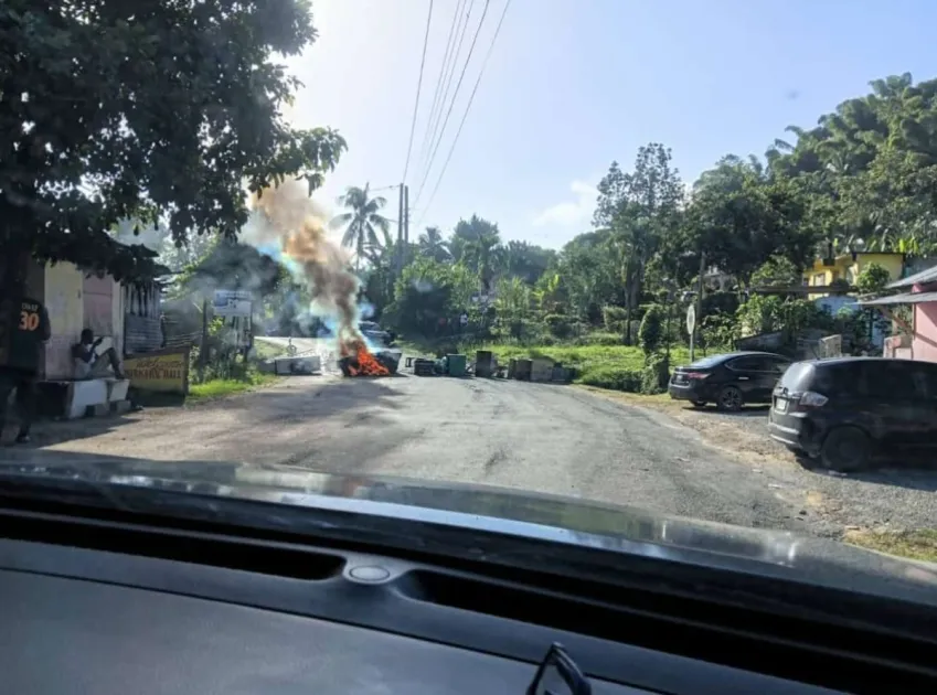 Residents of Harkers Hall blocked roads and demanded answers after Lenroy York was found dead following his removal from a community event.